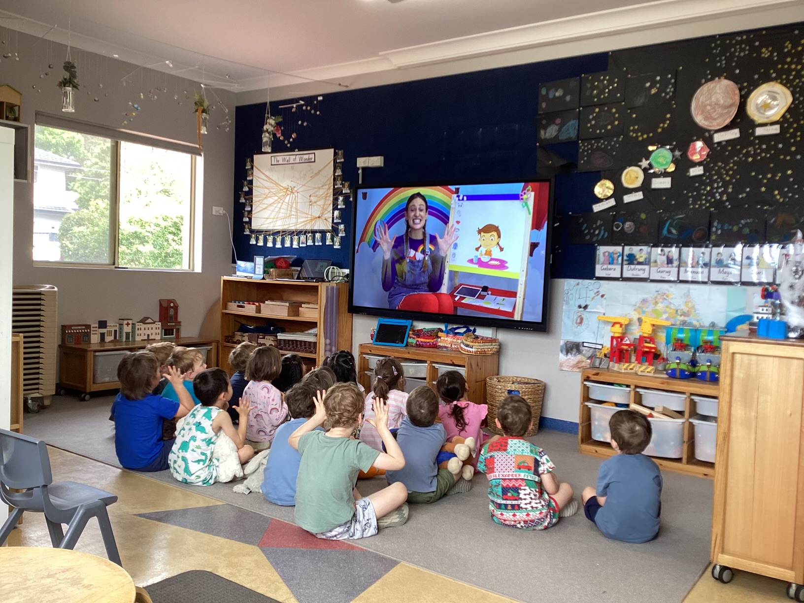 Children participating together in a Kick Start Language and Literacy lesson